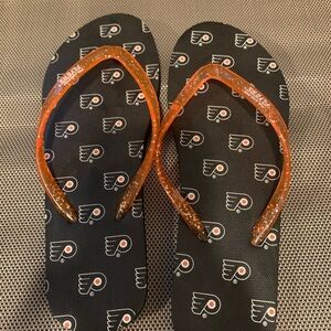 Black and Orange Flip Flops